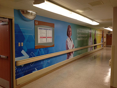 Printed wall mural installed along a hospital corridor in San Diego