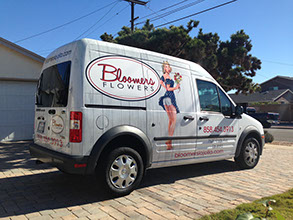 Full vehicle wrap on a white florist delivery van in San Diego