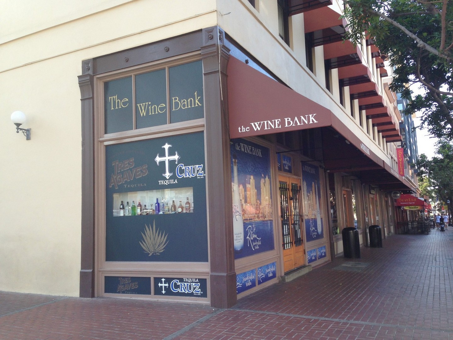 Storefront window graphics and signage on a Gaslamp Quarter wine bar
